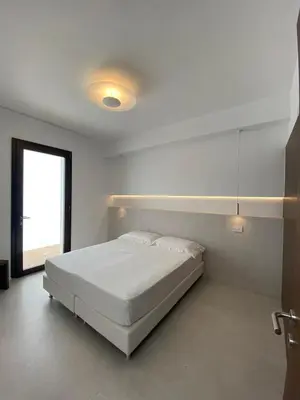 Letto o letti in una camera di Domo La Vela