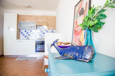 Cucina o angolo cottura di Casa Fendemare, vista sul golfo IUNQ2620