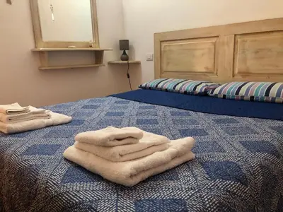 Letto o letti in una camera di Marina Butterfly