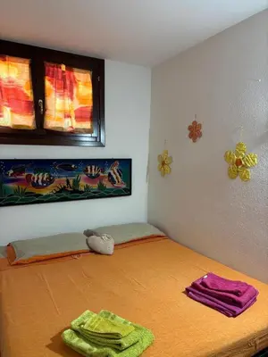 Letto o letti in una camera di Appartamento accogliente