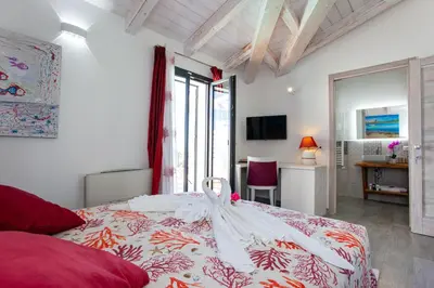 Letto o letti in una camera di Villa Elisir Luxury - Le Residenze del Mare