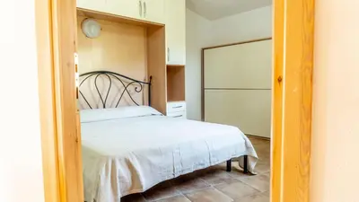 Letto o letti in una camera di Appartamenti Dodi LT - PMS CaseVacanze