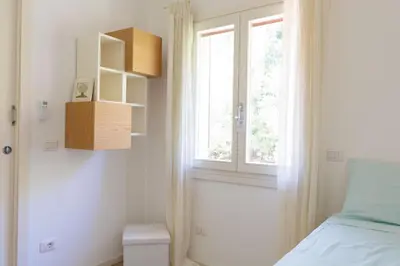 Letto o letti in una camera di Sunrise Sisters' Home