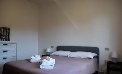 Letto o letti in una camera di Marina Maria Apartment