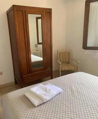 Letto o letti in una camera di Marina Maria Apartment