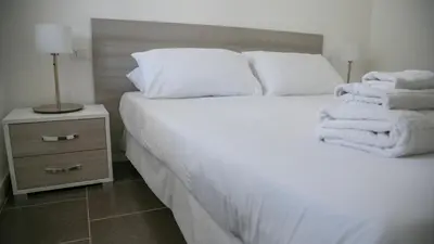 Letto o letti in una camera di Luminosa - Cala Gonone