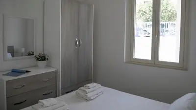 Letto o letti in una camera di Luminosa - Cala Gonone