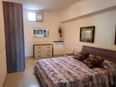Letto o letti in una camera di Casa Samuel