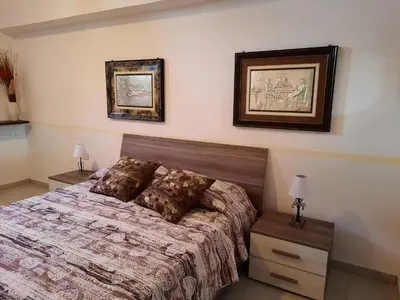 Letto o letti in una camera di Casa Samuel