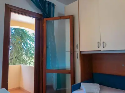 Letto o letti in una camera di Appartamento vista mare Coghe Fae - Ammentos Posada