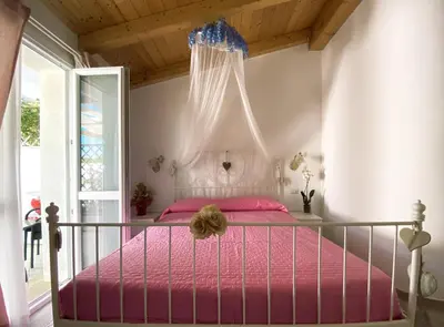 Letto o letti in una camera di La Cuppulata 2 - Stile Romantico