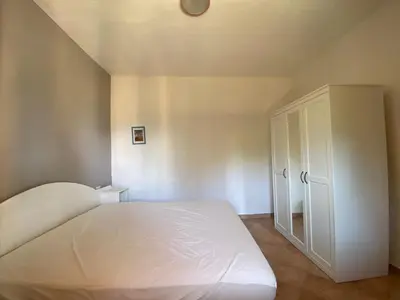Letto o letti in una camera di Appartamenti Cala d'Ambra
