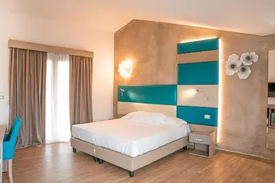 Letto o letti in una camera di AQUA SARDINIA boutique hotel