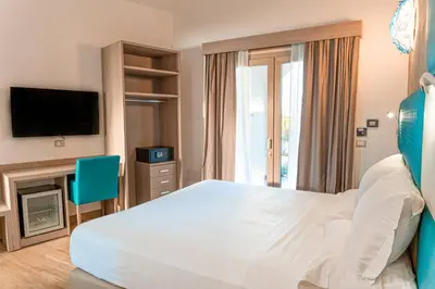TV o dispositivi per l'intrattenimento presso AQUA SARDINIA boutique hotel