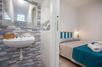 Letto o letti in una camera di Camere Tirreno 1