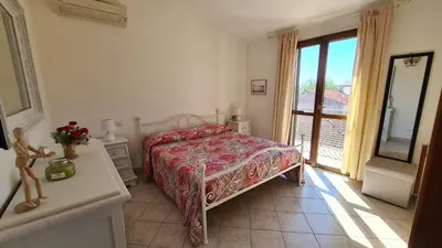 Letto o letti in una camera di La Coccinella