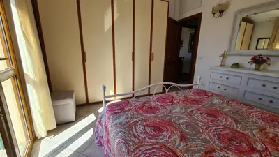 Letto o letti in una camera di La Coccinella