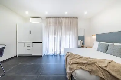 Letto o letti in una camera di NG Guest House il Gallura