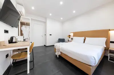 Letto o letti in una camera di NG Guest House il Gallura