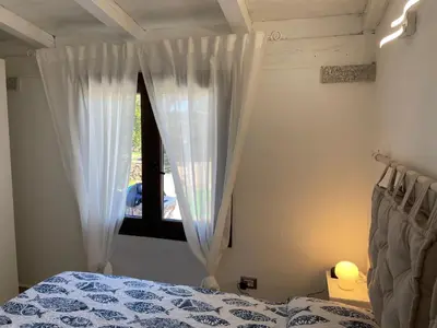 Letto o letti in una camera di Splendida Villetta San Teodoro