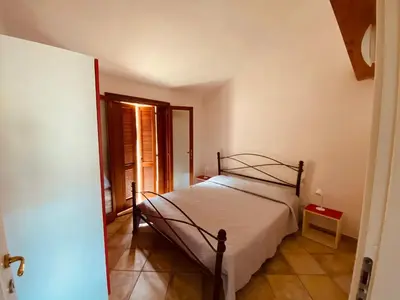 Letto o letti in una camera di Residenze Il Girasole
