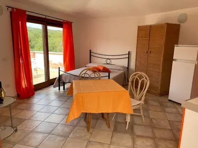 Letto o letti in una camera di Residenze Il Girasole