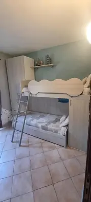 Letto o letti in una camera di Casa Cala Sardegna Budoni Residence con Piscina