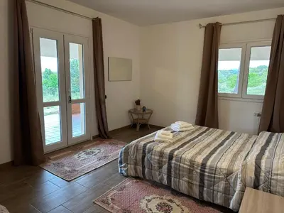 Letto o letti in una camera di Domo Mia