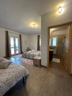 Letto o letti in una camera di Domo Mia
