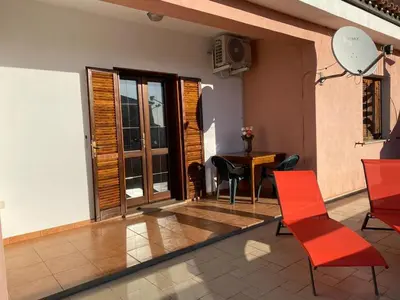 Area soggiorno di Comfy and bright apartment