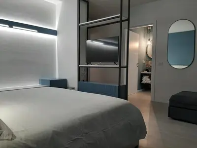 Letto o letti in una camera di Kore Home