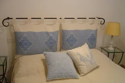 Letto o letti in una camera di Casa Fede
