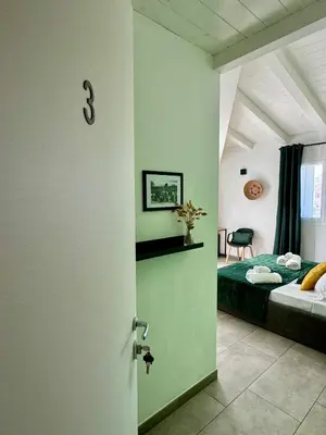 Letto o letti in una camera di Citroom - green city rooms