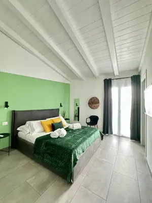 Letto o letti in una camera di Citroom - green city rooms