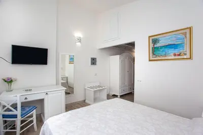 TV o dispositivi per l'intrattenimento presso La Casa in Collina - affittacamere con vista mare