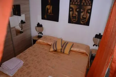 Letto o letti in una camera di La Cuppulata - Stile Classico
