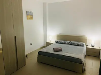 Letto o letti in una camera di Villa Cedrino Orosei