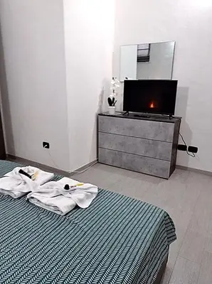 Letto o letti in una camera di Case vacanze Rosa