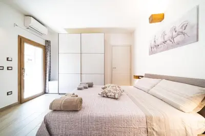 Letto o letti in una camera di B&B Gonare