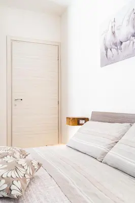 Letto o letti in una camera di B&B Gonare