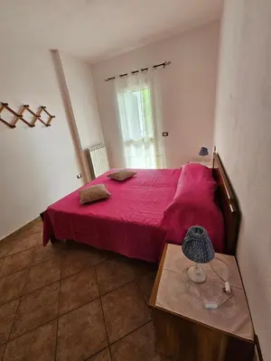 Letto o letti in una camera di Casa nurache Gesuina