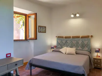 Letto o letti in una camera di panoramic ROOMS Fora e ' Muros with sea view common terrace , Ammentos Posada