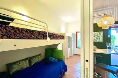 Letto o letti in una camera di Boho Chic Beach Resort in Sardegna