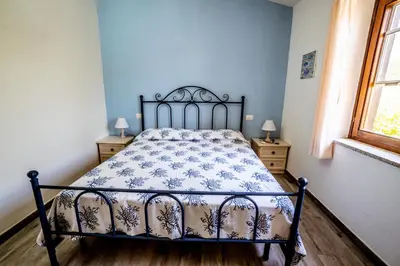 Letto o letti in una camera di Appartamento La Collinetta LT - PMS CaseVacanze