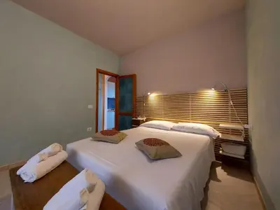 Letto o letti in una camera di Lu Canaleddu