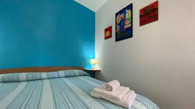 Letto o letti in una camera di Manunta Holiday House - Maria - UINQ0474