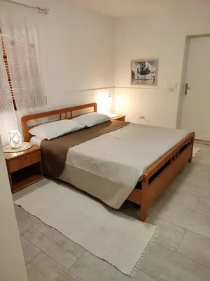 Letto o letti in una camera di Casa Patrizia