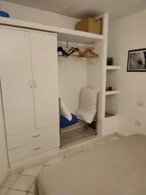 Letto o letti in una camera di Casa Patrizia