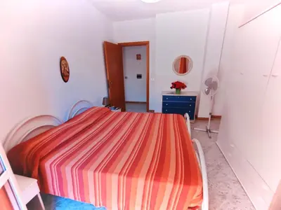 Letto o letti in una camera di Appartamento Marco Polo