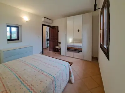 Letto o letti in una camera di Appartamento Residenziale Trilocale 4 posti letto Stella Marina